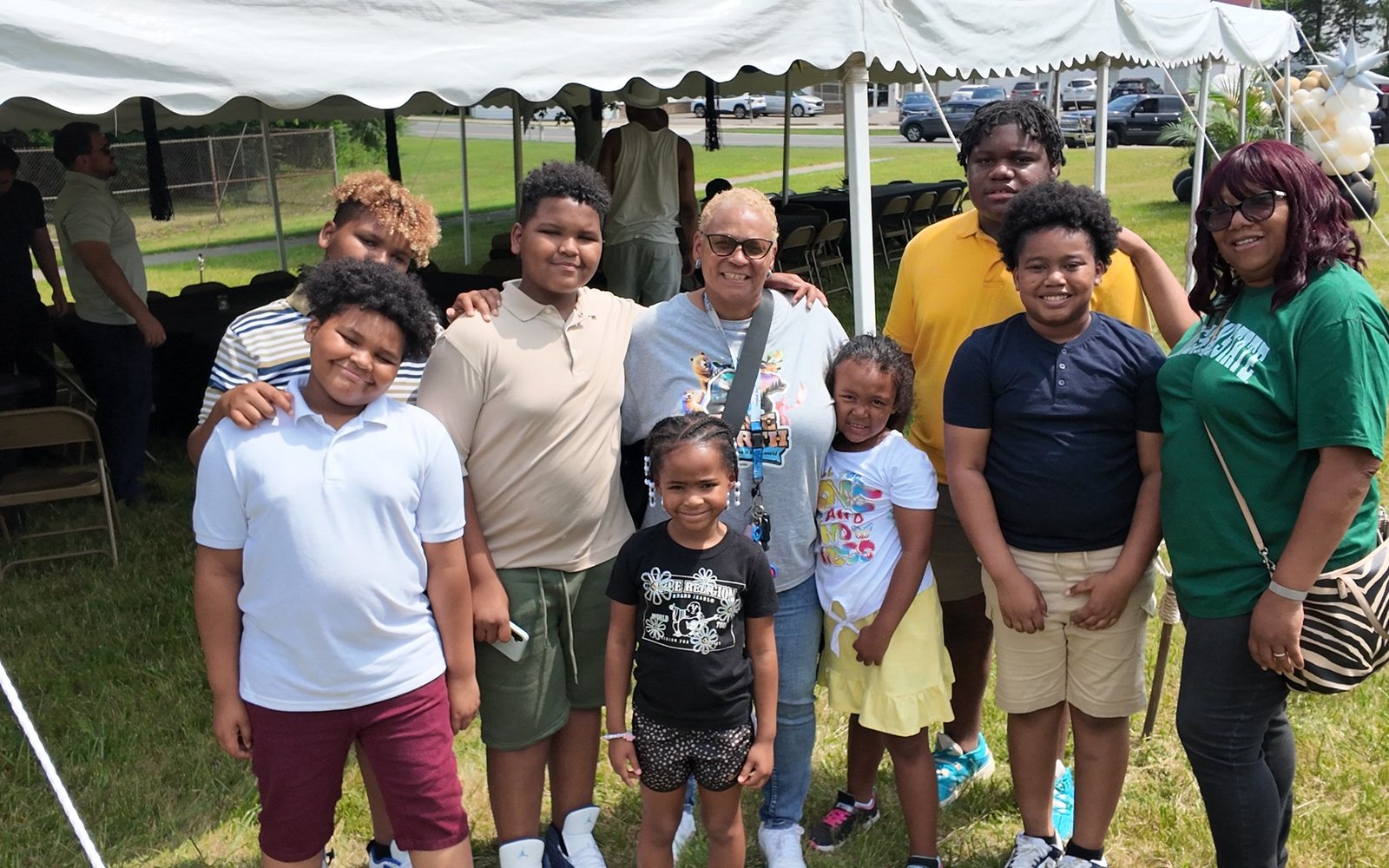 Golden Opportunity Club members and community supporters gathered outside