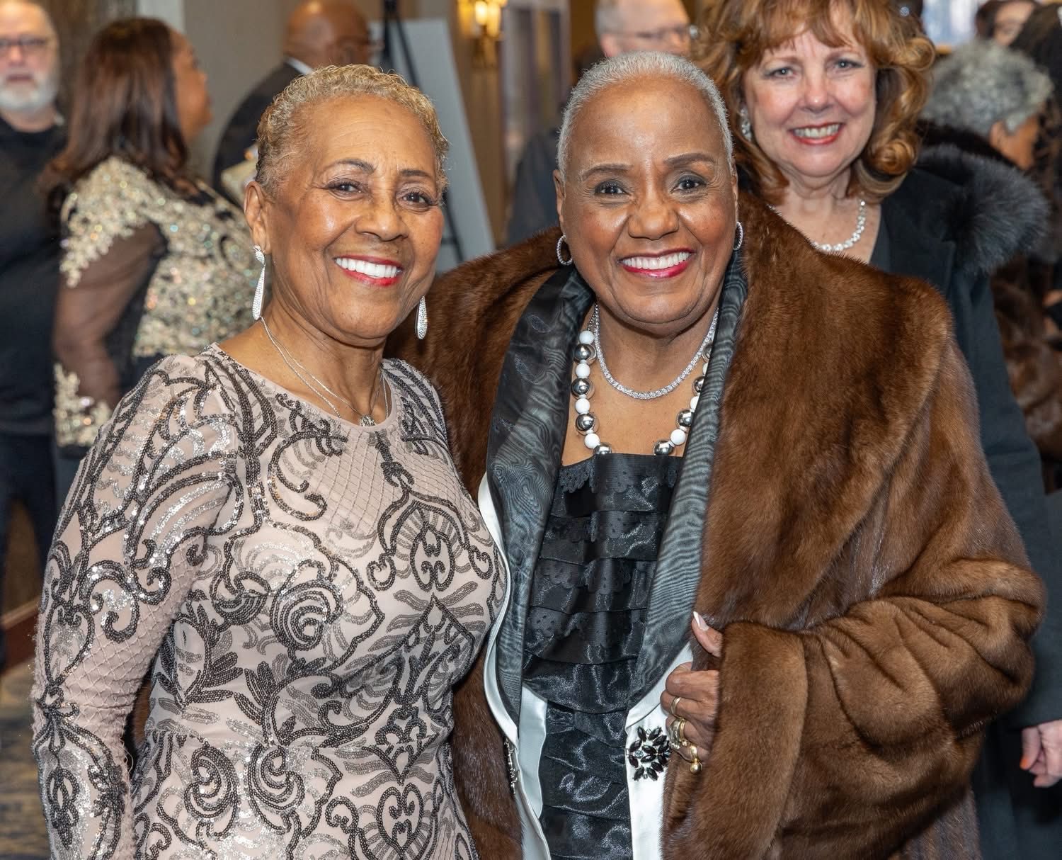 Golden Opportunity Club members smiling at an event